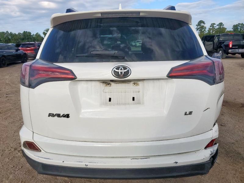 Photo 6 from auction – 2016 TOYOTA RAV4 LE with VIN JTMZFREV6GJ095358