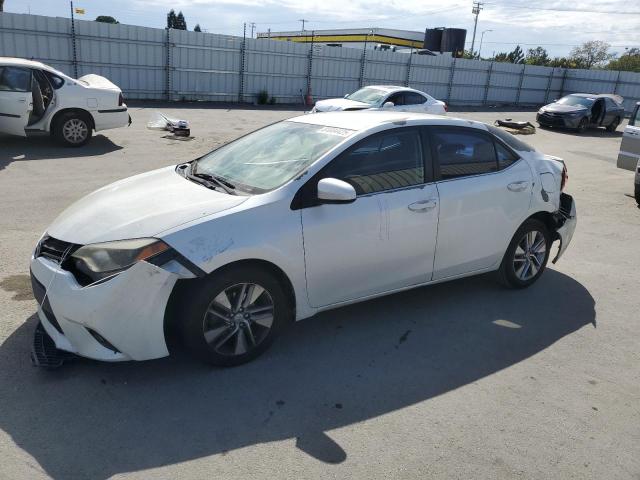 TOYOTA COROLLA EC 2014 with VIN 5YFBPRHE6EP037429 - Photo from auction