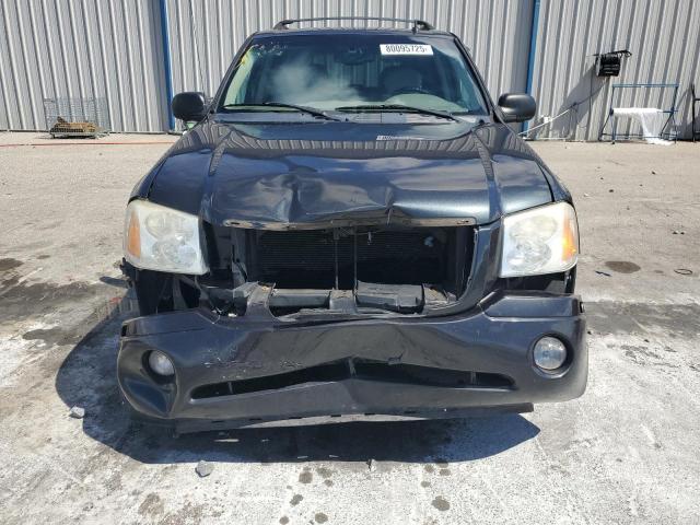 Photo 5 from auction – 2006 GMC ENVOY with VIN 1GKDS13S062141277