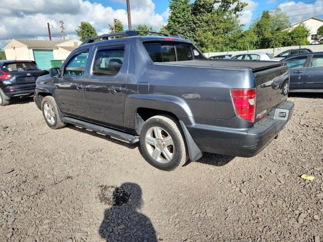 Photo 2 from auction – 2010 HONDA RIDGELINE with VIN 5FPYK1F50AB011015