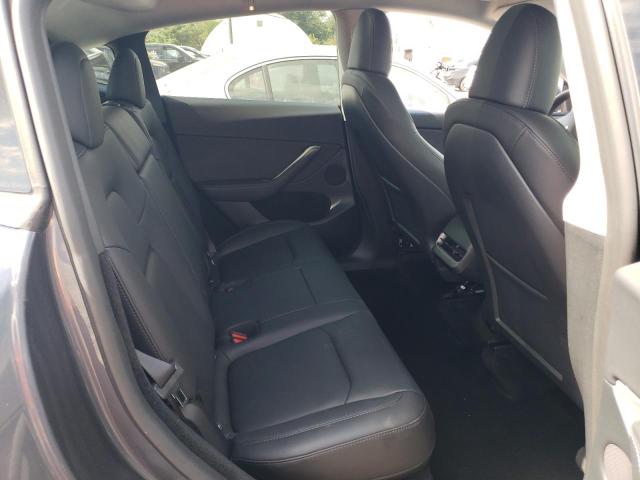 Photo 11 from auction – 2023 TESLA MODEL Y with VIN 7SAYGDEE8PF880700