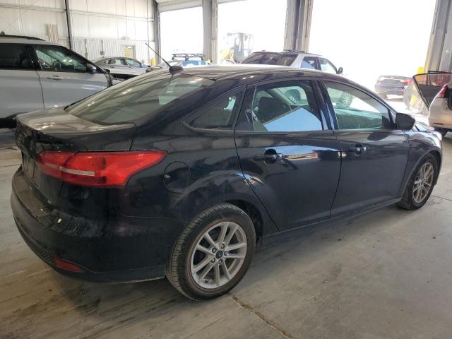 Photo 3 from auction – 2017 FORD FOCUS SE with VIN 1FADP3F24HL288466