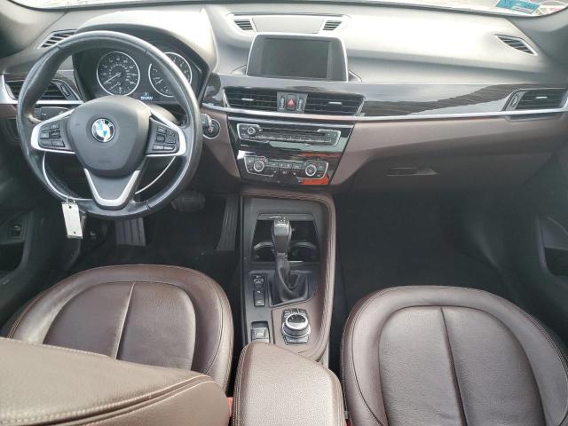 Photo 8 from auction – 2017 BMW X1 XDRIVE2 with VIN WBXHT3Z34H4A64920