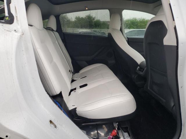Photo 11 from auction – 2023 TESLA MODEL Y with VIN 7SAYGDED1PF962095