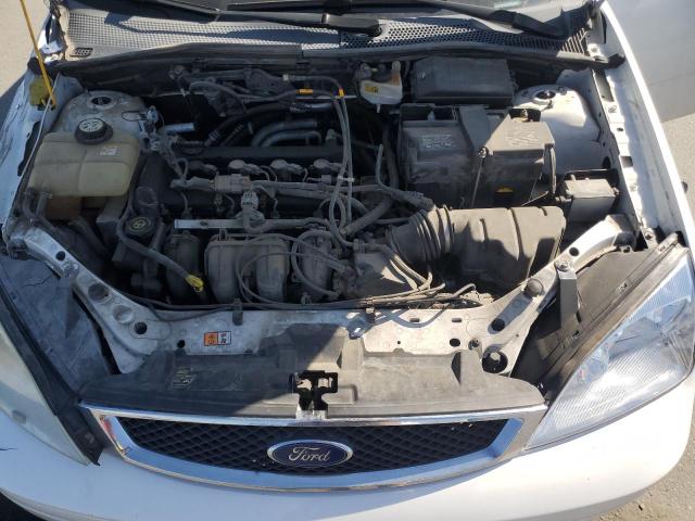 Photo 11 from auction – 2007 FORD FOCUS ZX3 with VIN 1FAFP31N37W199348