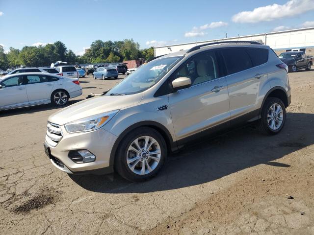 FORD ESCAPE SE 2018 with VIN 1FMCU9GD5JUA68248 - Photo from auction