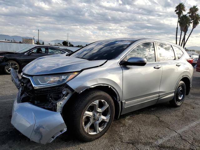 HONDA CR-V 2018 with VIN 5J6RW1H59JA010723 - Photo from auction