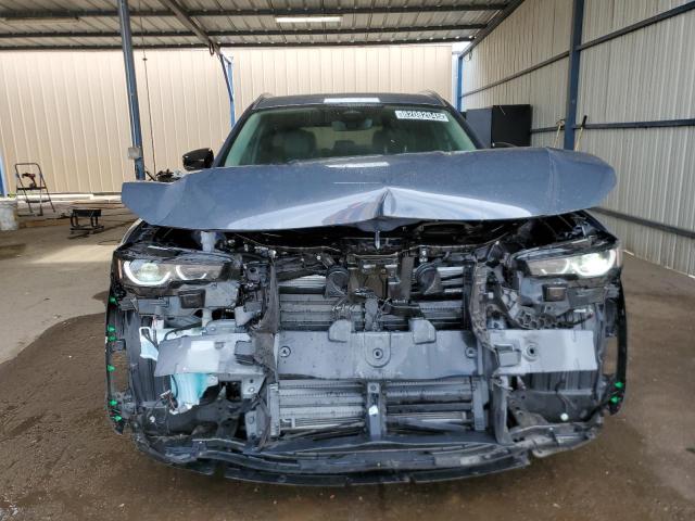 Photo 5 from auction – 2025 MAZDA CX-50 PREM with VIN 7MMVABDM4SN374807