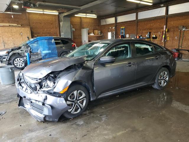 HONDA CIVIC LX 2018 with VIN 2HGFC2F54JH609378 - Photo from auction