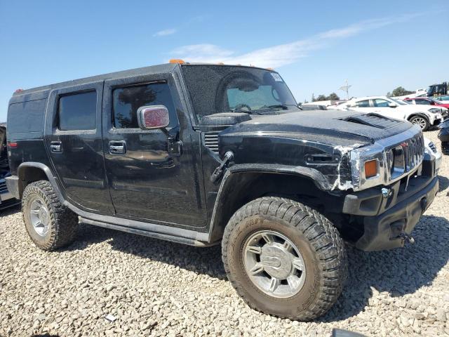 Photo 4 from auction – 2003 HUMMER H2 with VIN 5GRGN23U33H103038