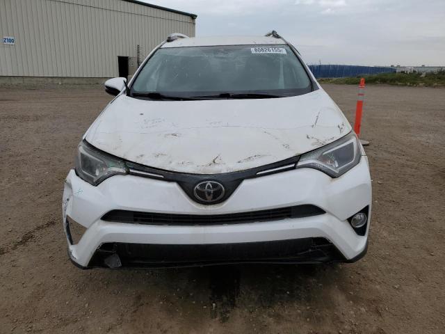 Photo 5 from auction – 2018 TOYOTA RAV4 LE with VIN 2T3BFREV2JW729176