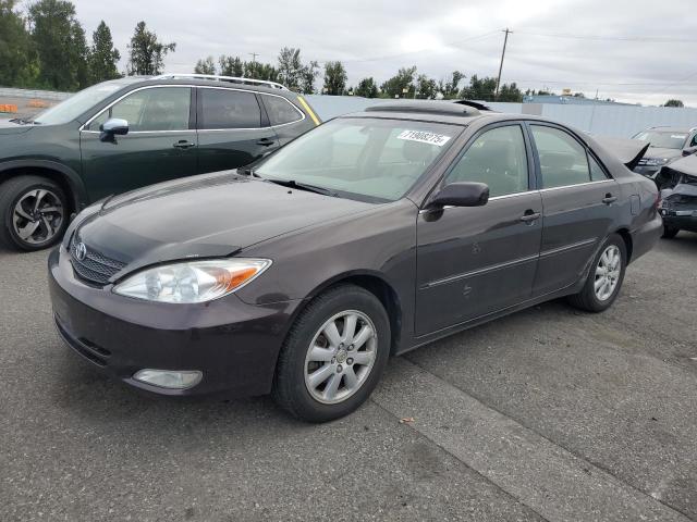 TOYOTA CAMRY LE 2003 with VIN JTDBF30K330092929 - Photo from auction