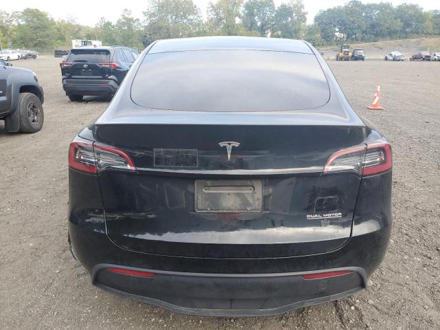 Photo 6 from auction – 2023 TESLA MODEL Y with VIN 7SAYGDEF0PF808883