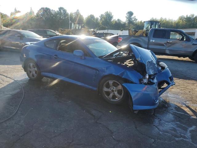 Photo 4 from auction – 2005 HYUNDAI TIBURON with VIN KMHHM65D15U174581