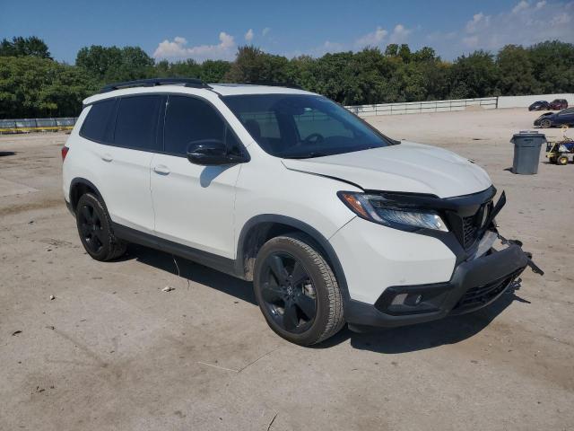 Photo 4 from auction – 2021 HONDA PASSPORT E with VIN 5FNYF8H07MB010830