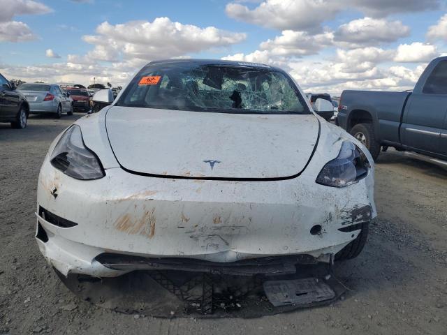 Photo 5 from auction – 2022 TESLA MODEL 3 with VIN 5YJ3E1EA5NF358757