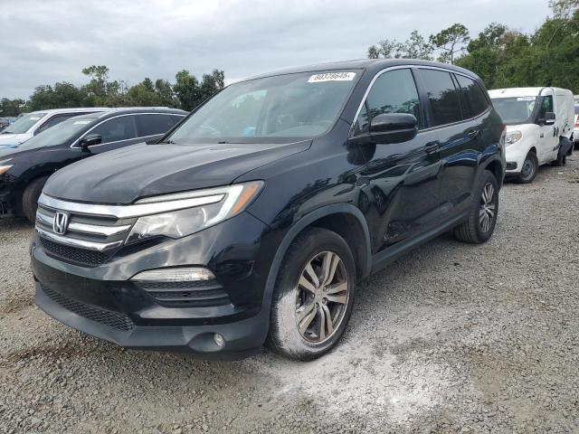 HONDA PILOT EXL 2018 with VIN 5FNYF5H52JB001667 - Photo from auction
