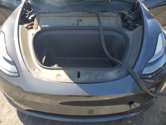 Photo 12 from auction – 2022 TESLA MODEL Y with VIN 7SAYGDEFXNF337046