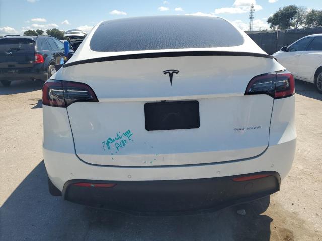 Photo 6 from auction – 2022 TESLA MODEL Y with VIN 7SAYGDEE5NF437823