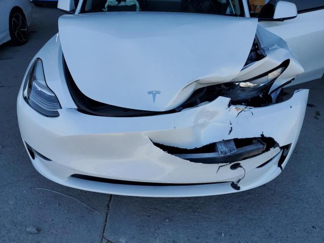 Photo 11 from auction – 2023 TESLA MODEL Y with VIN 7SAYGDEE9PA138142