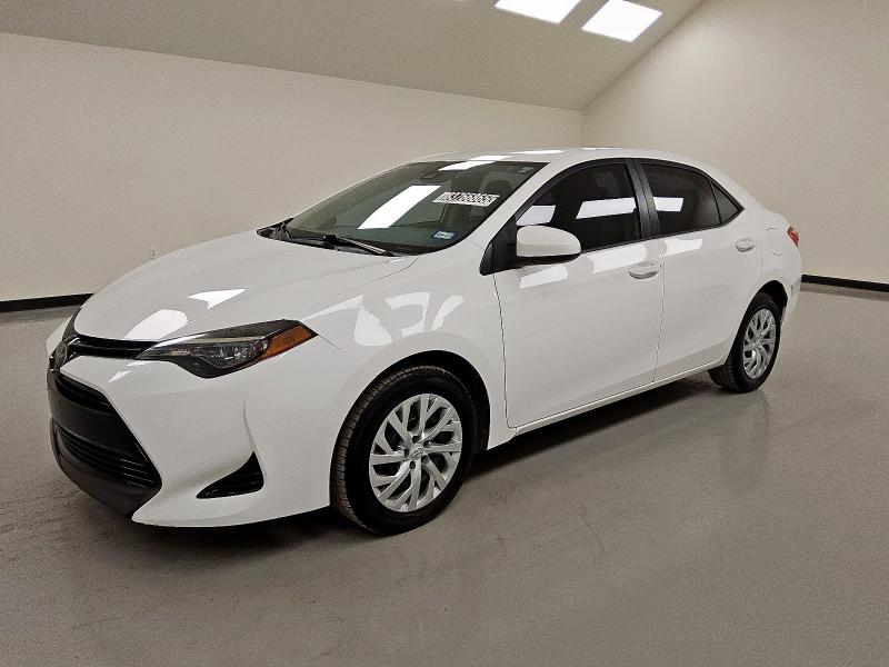 TOYOTA COROLLA L 2018 with VIN 5YFBURHEXJP847939 - Photo from auction