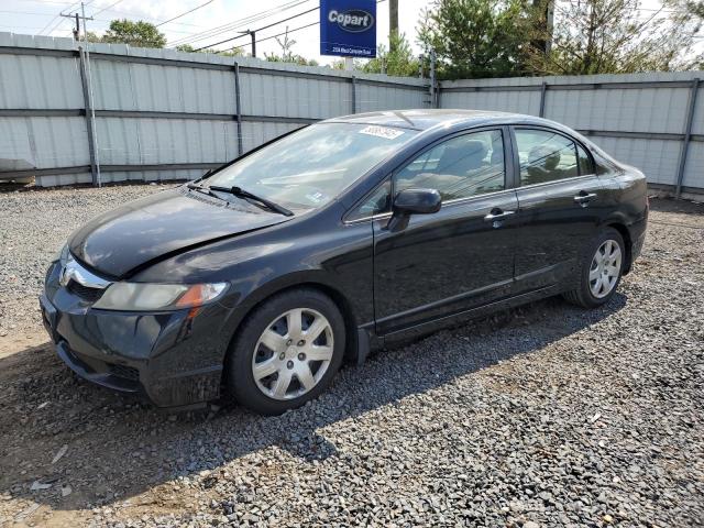 HONDA CIVIC LX 2011 with VIN 2HGFA1F54BH304674 - Photo from auction