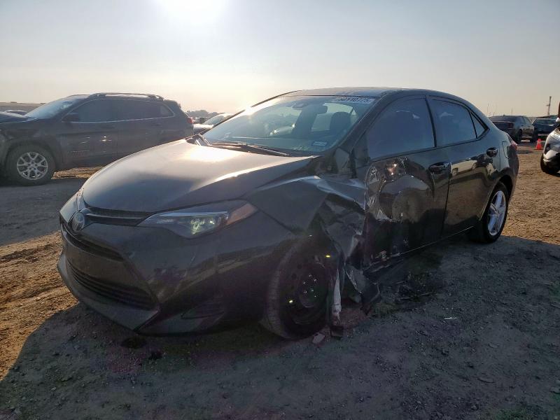 TOYOTA COROLLA L 2019 with VIN 5YFBURHE6KP879658 - Photo from auction