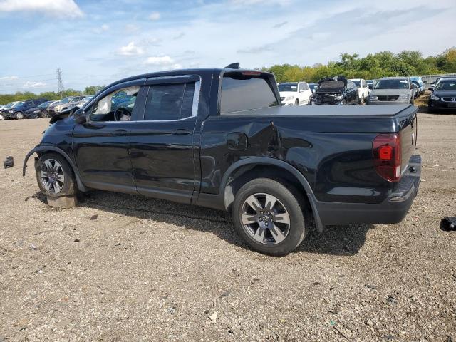 Photo 2 from auction – 2017 HONDA RIDGELINE with VIN 5FPYK3F66HB007596