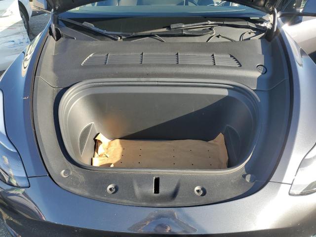 Photo 12 from auction – 2023 TESLA MODEL Y with VIN 7SAYGAEE0PF864389