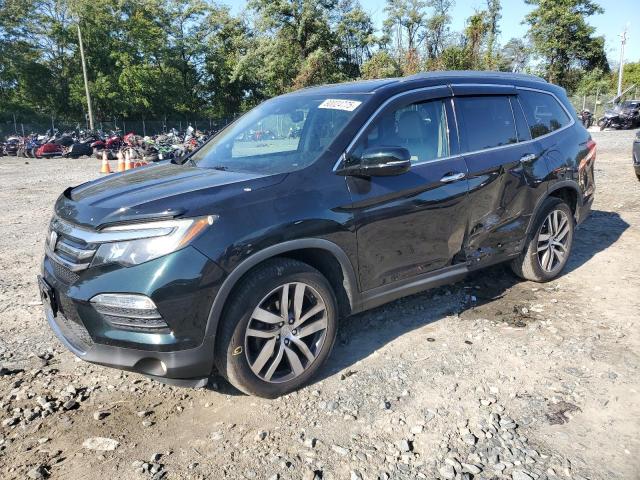 HONDA PILOT TOURING 2016 with VIN 5FNYF6H98GB029281 - Photo from auction