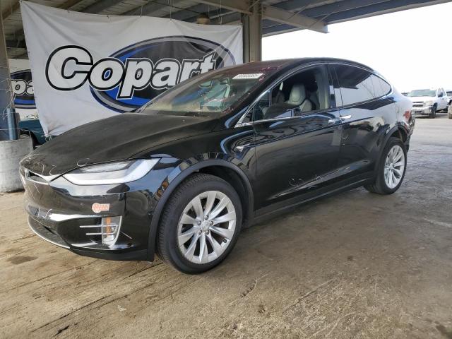 TESLA MODEL X 2018 with VIN 5YJXCBE24JF113609 - Photo from auction