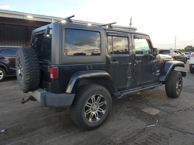 Photo 3 from auction – 2011 JEEP WRANGLER U with VIN 1J4BA5H12BL527906