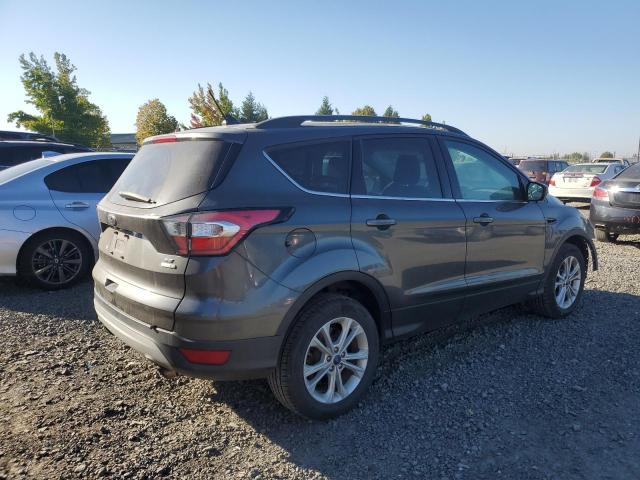 Photo 3 from auction – 2018 FORD ESCAPE SE with VIN 1FMCU9GDXJUA92383