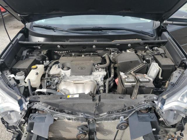 Photo 12 from auction – 2018 TOYOTA RAV4 LE with VIN 2T3BFREV0JW834623
