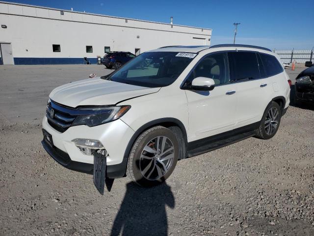 HONDA PILOT ELIT 2016 with VIN 5FNYF6H0XGB020714 - Photo from auction