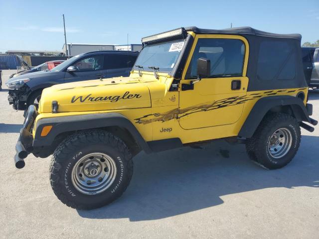 JEEP WRANGLER / 2000 with VIN 1J4FA49S2YP743548 - Photo from auction