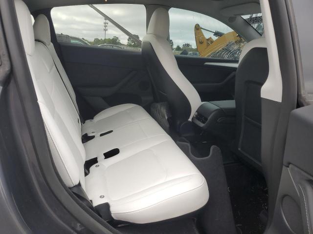 Photo 10 from auction – 2023 TESLA MODEL Y with VIN 7SAYGDEF1PF897895