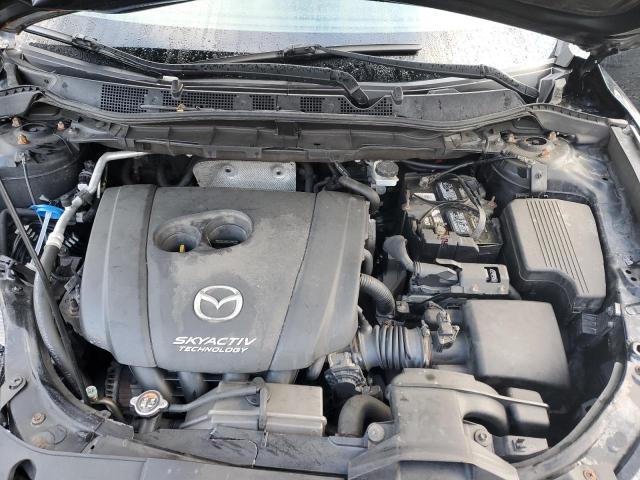 Photo 12 from auction – 2015 MAZDA CX-5 SPORT with VIN JM3KE2BE9F0440233