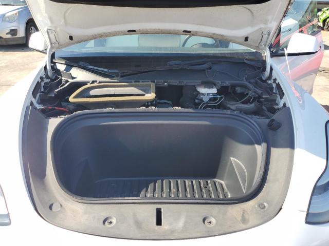 Photo 11 from auction – 2021 TESLA MODEL Y with VIN 5YJYGDED9MF163299