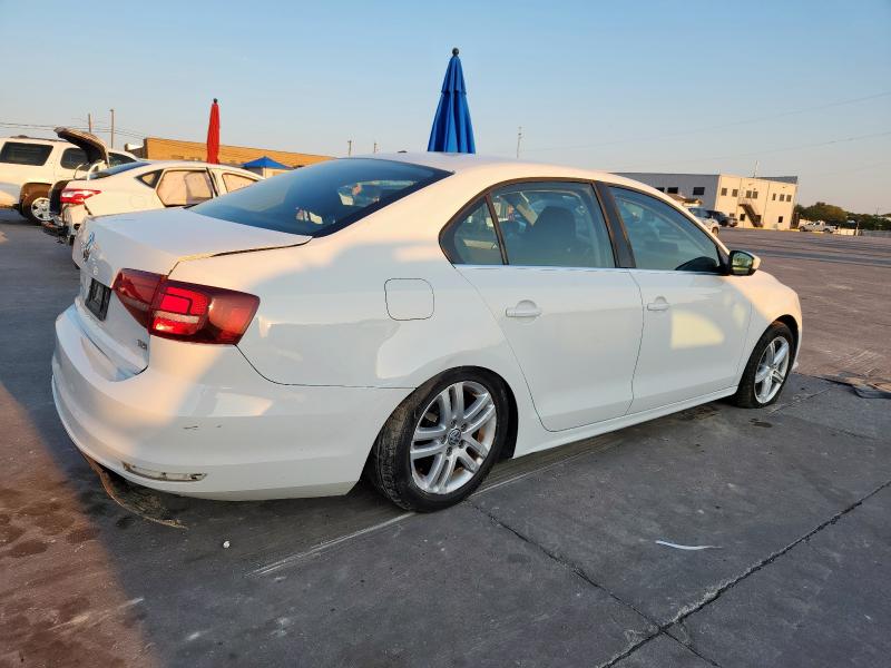 Photo 3 from auction – 2017 VOLKSWAGEN JETTA S with VIN 3VW2B7AJ8HM305982