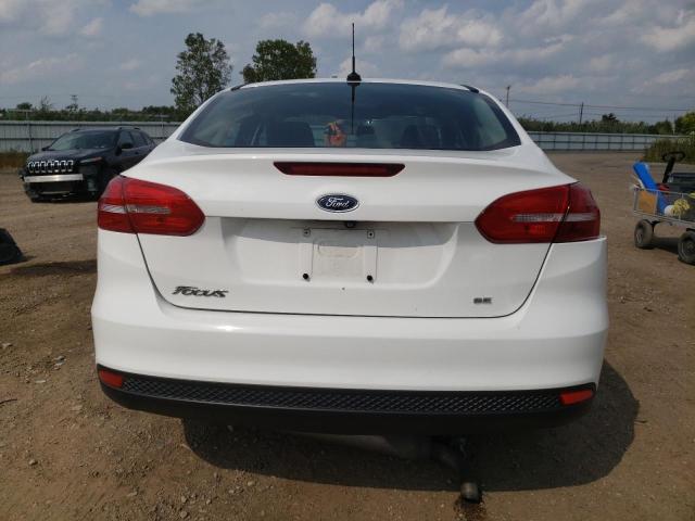 Photo 6 from auction – 2018 FORD FOCUS SE with VIN 1FADP3F27JL257668