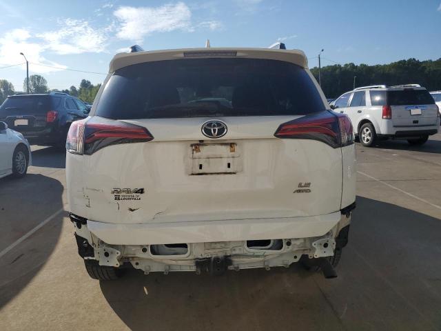 Photo 6 from auction – 2018 TOYOTA RAV4 LE with VIN 2T3BFREV0JW756568