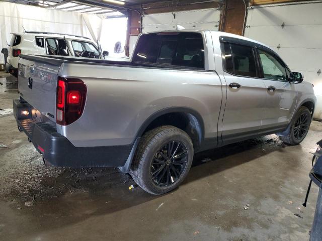 Photo 3 from auction – 2022 HONDA RIDGELINE with VIN 5FPYK3F70NB008263