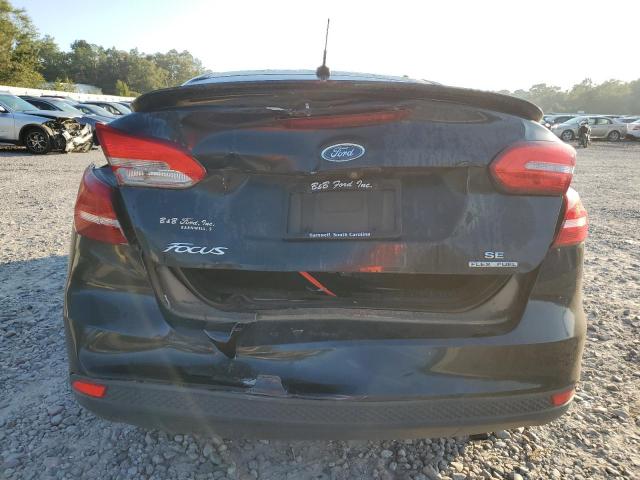 Photo 6 from auction – 2015 FORD FOCUS SE with VIN 1FADP3F21FL238377
