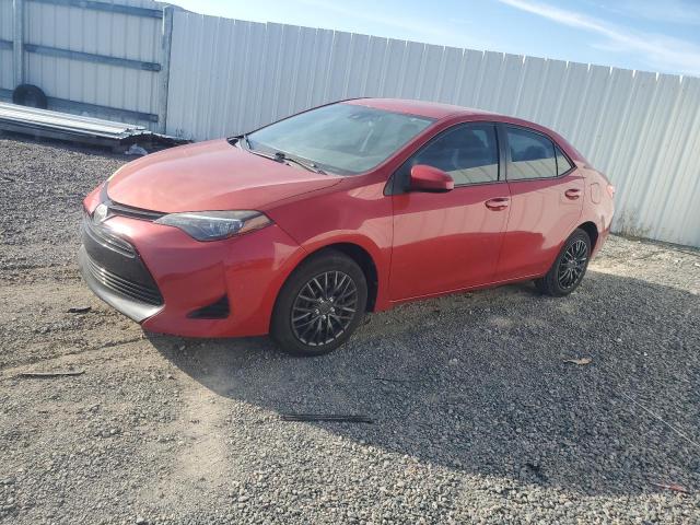TOYOTA COROLLA L 2018 with VIN 5YFBURHE3JP825670 - Photo from auction