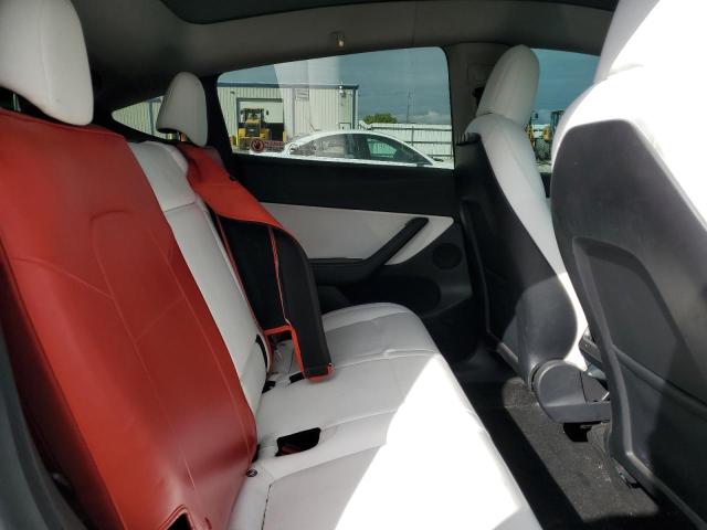 Photo 11 from auction – 2021 TESLA MODEL Y with VIN 5YJYGDEE9MF189829