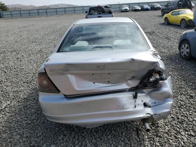 Photo 6 from auction – 2002 HONDA CIVIC LX with VIN 1HGEM22552L048871