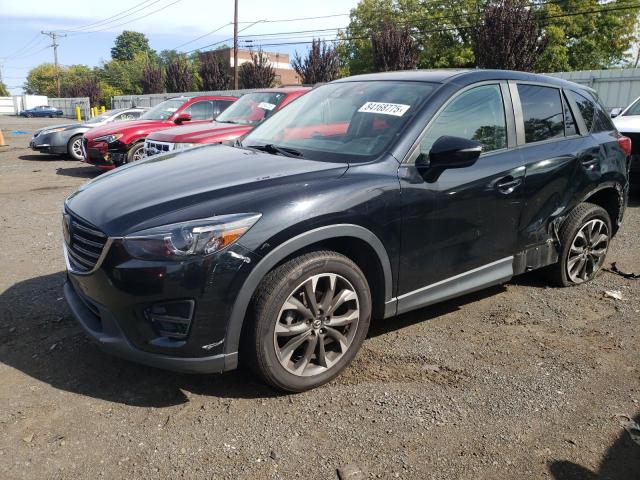 MAZDA CX-5 GT 2016 with VIN JM3KE4DY8G0865799 - Photo from auction