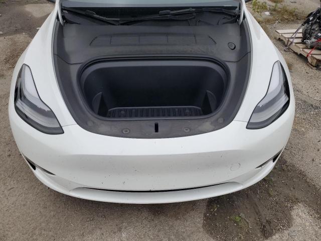 Photo 11 from auction – 2023 TESLA MODEL Y with VIN 7SAYGDEE9PF889292