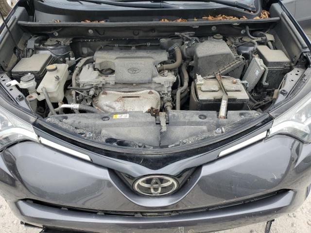 Photo 12 from auction – 2018 TOYOTA RAV4 LE with VIN 2T3BFREV4JW848623